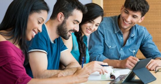 Happy student studying together