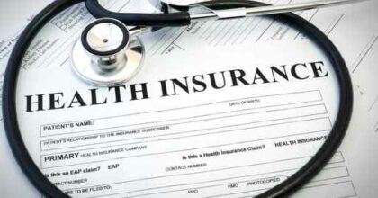 Health insurance form with stethoscope