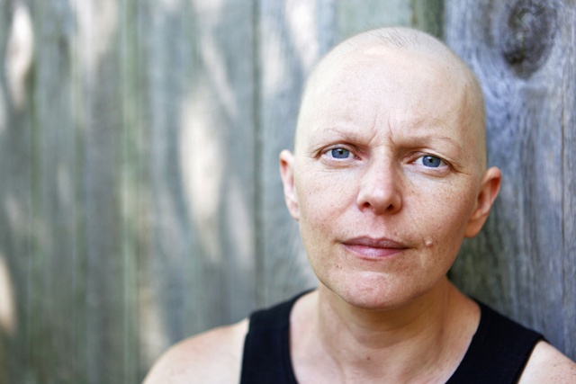 Portrait of a female cancer patient outside