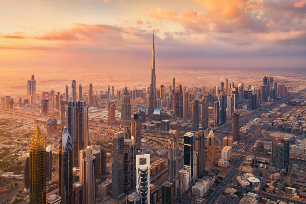 Moving from UK to Dubai financial guide for British expats - Dubai skyline at sunset showing Burj Khalifa - The Michele Carby Practice